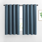 NICETOWN Smoky Blue Blackout Curtains for Bedroom - Triple Weave Grommet Top Thermal Insulated Window Treatment Light Blocking Drapes for Cafe/Home Office, W46 x L54, Set of 2