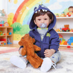 24-inch lifelike Reborn doll, handmade vinyl, soft fabric body with wig Hair realistic child
