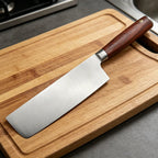 Professional chefs kitchen knife for cutting meat. Kitchen decorative wooden handle made of stainless steel for cooking utensils